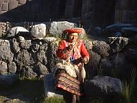 A woman spinning wool